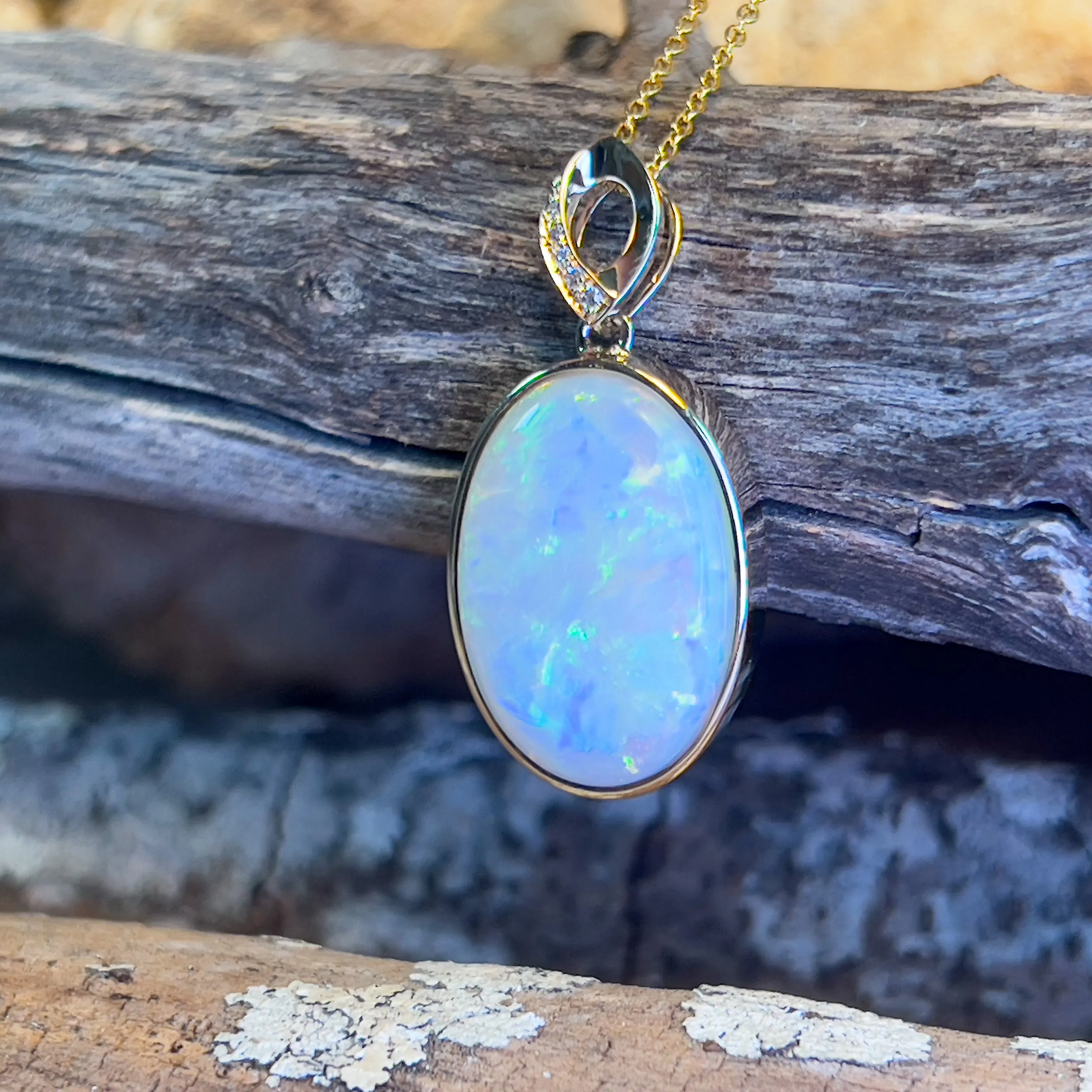 14kt Yellow Gold Large Opal 11.26ct oval shape pendant bezel set