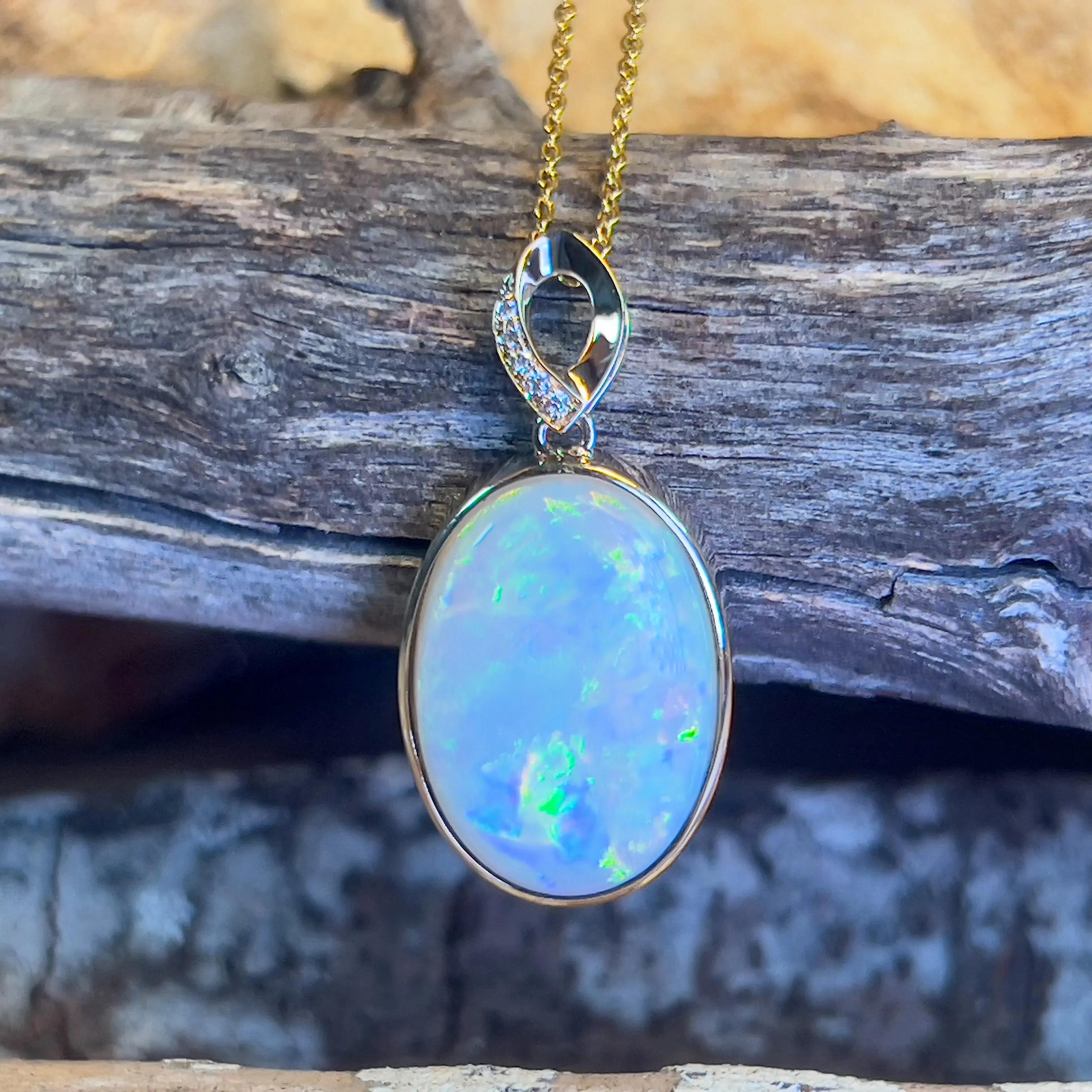 14kt Yellow Gold Large Opal 11.26ct oval shape pendant bezel set